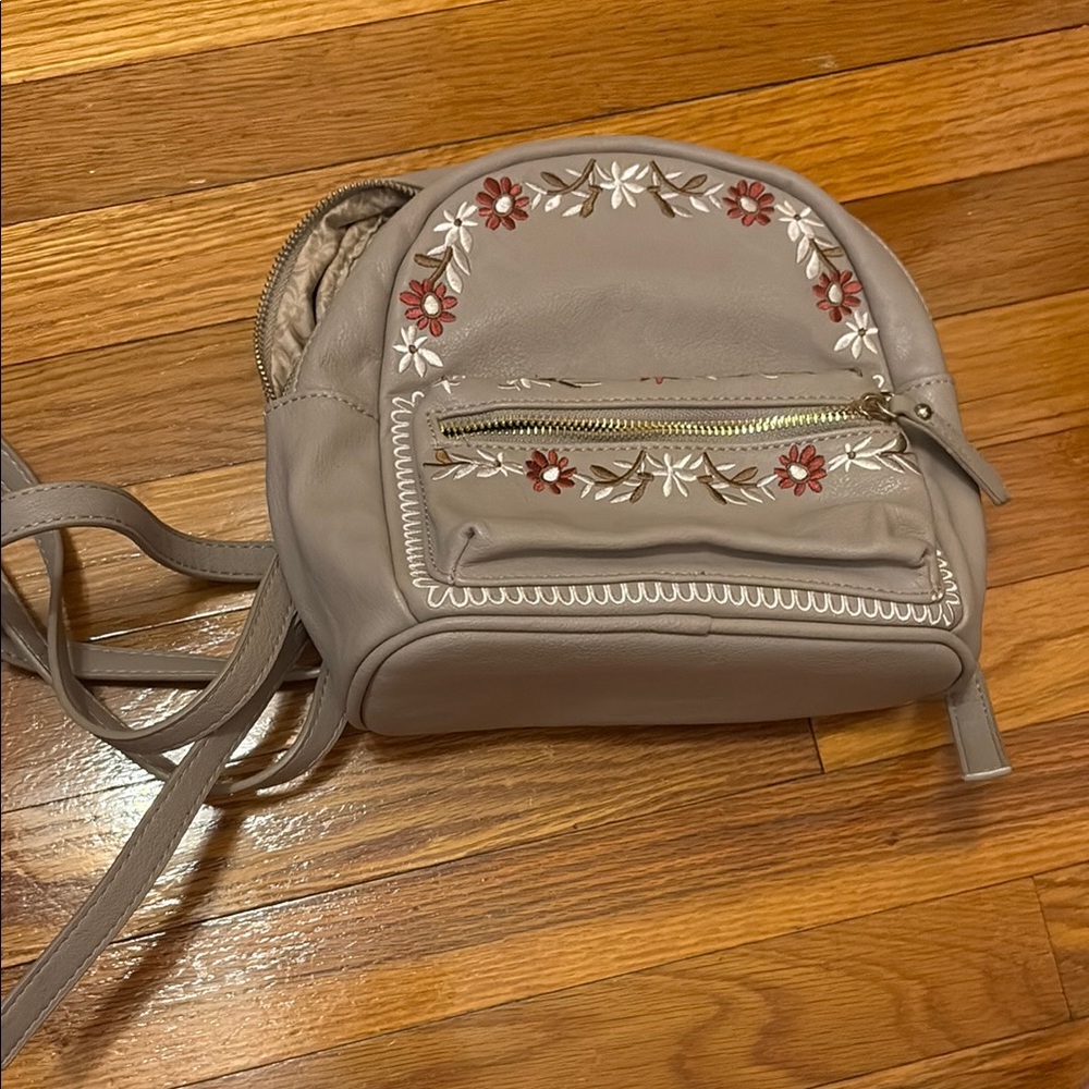 Charming Charlie Tan and Red Backpack with Floral Embroidery